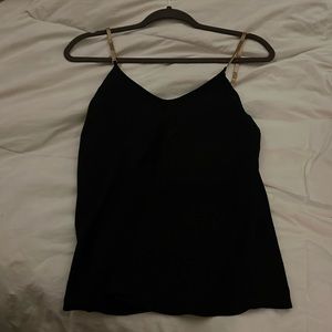 Express black and gold tank